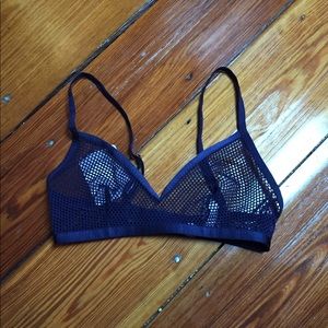 Two fishnet bralettes from Savage X Fenty.